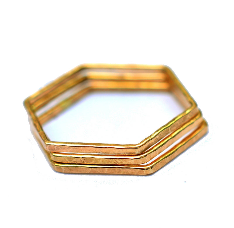 gold hexagon stackable rings by aquarian thoughts jewelry