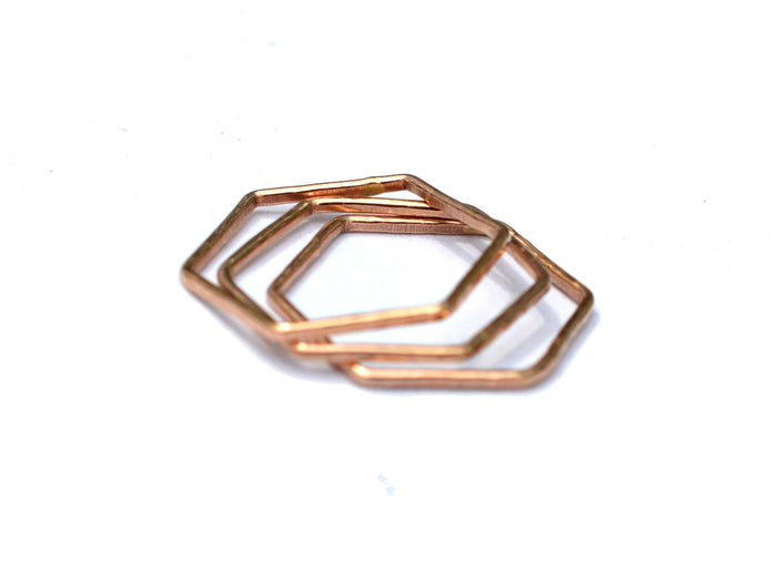 rose gold hexagon stackable rings by aquarian thoughts jewelry